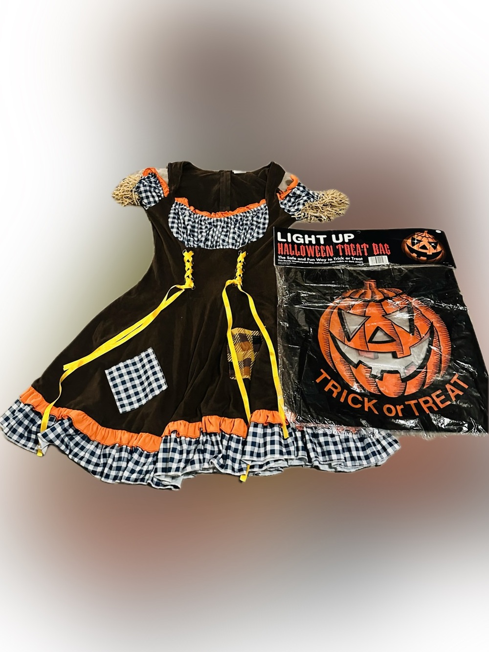 Spirit Halloween Women SMALL Scarecrow Dress with Light-Up Pumpkin Treat Bag